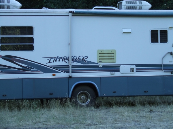 An RV with the words 